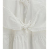 Mini Dress with a deep V-neckline and front tie bands