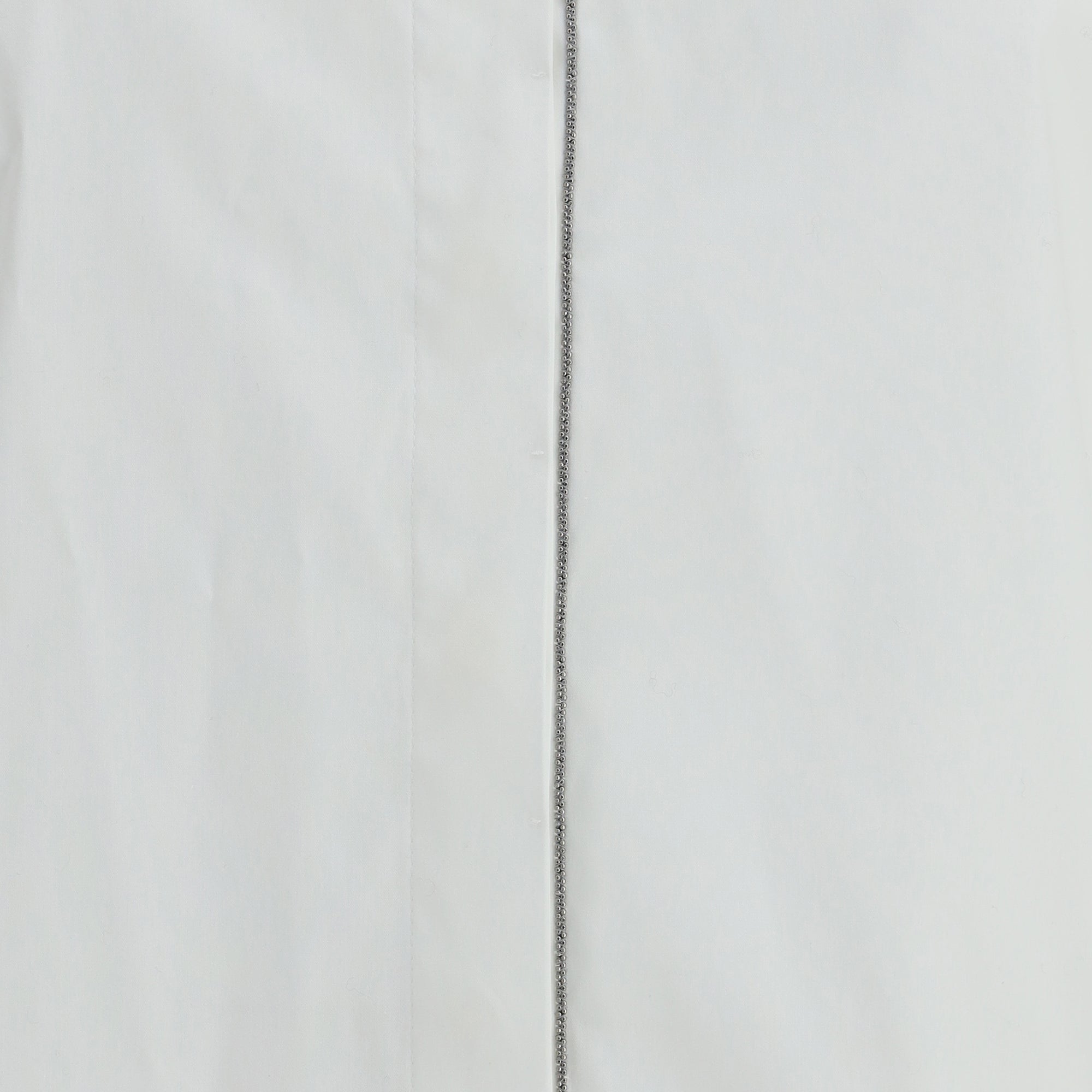 Shirt with embellishments