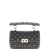 Rockstud Spike mini Top Handle Bag in nappa