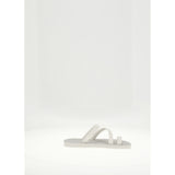 FLIP-FLOP WITH ASYMMETRIC CAGED UPPER