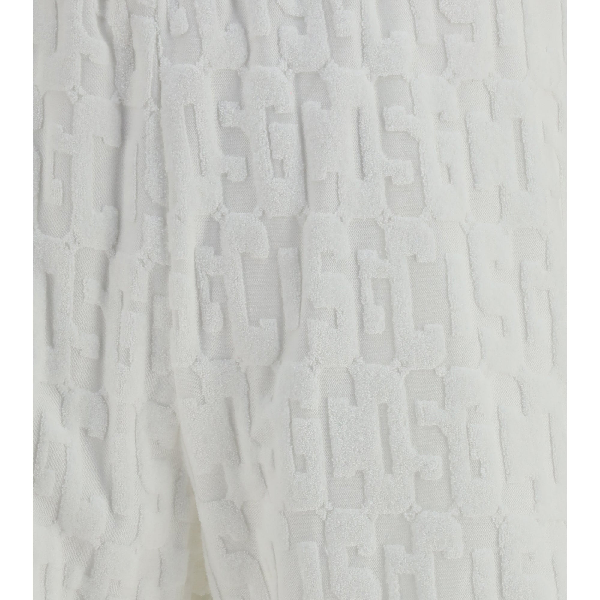 Shorts with all-over monogram